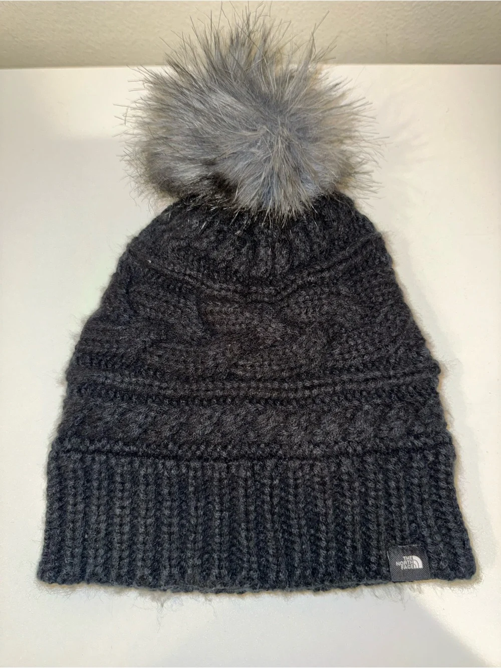The North Face Black Knit Pom Beanie with Gray Faux Fur Pom